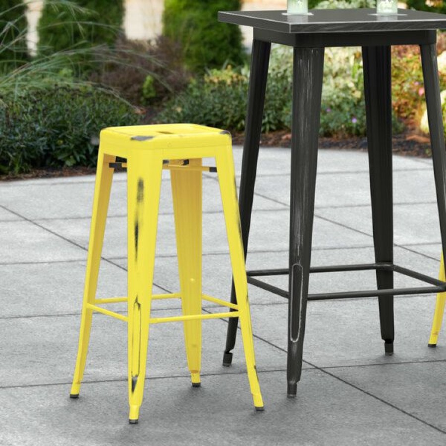 Outdoor Restaurant Bar Stools * | Wholesale Lt&S Alloy Series Lancaster Table & Seating Alloy Series Distressed Yellow Stackable Metal Indoor / Outdoor Industrial Barstool With Drain Hole Seat