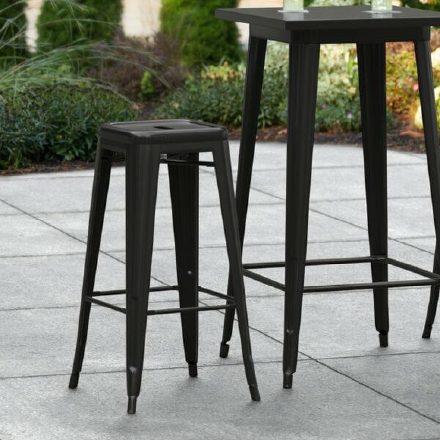 Outdoor Restaurant Bar Stools * | Outlet Lt&S Alloy Series Lancaster Table & Seating Alloy Series Black Stackable Metal Indoor / Outdoor Industrial Barstool With Drain Hole Seat